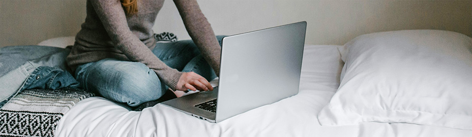 Person typing on laptop