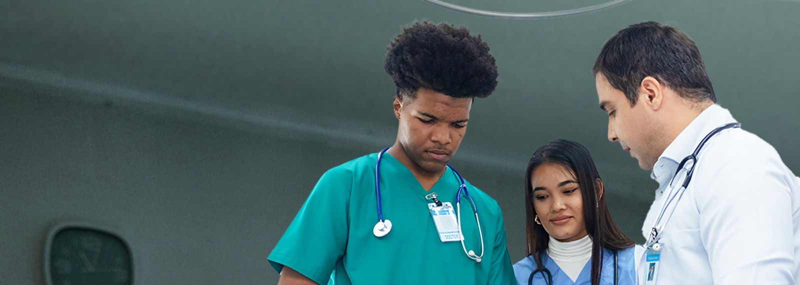 Students looking down with doctor