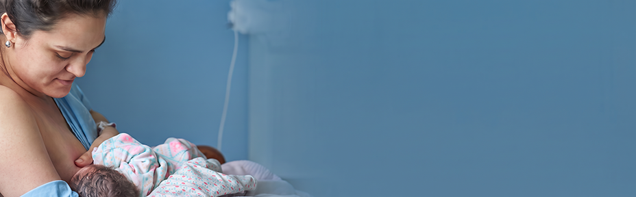 photo of women nursing a baby